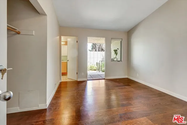 a large bathroom with a double vanity sink and a mirror
