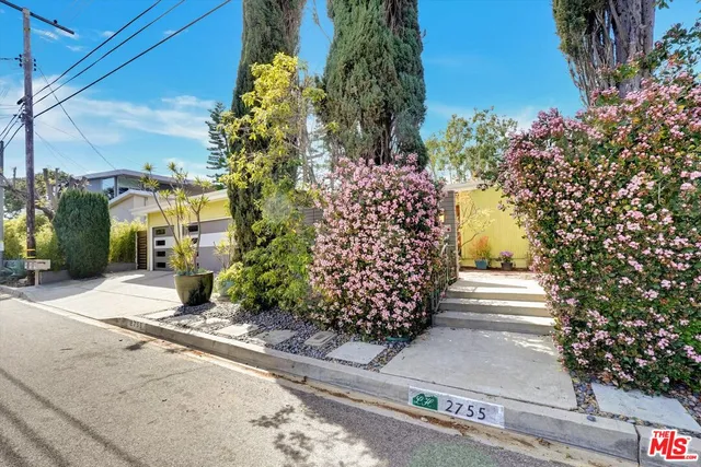 a view of a backyard of a house