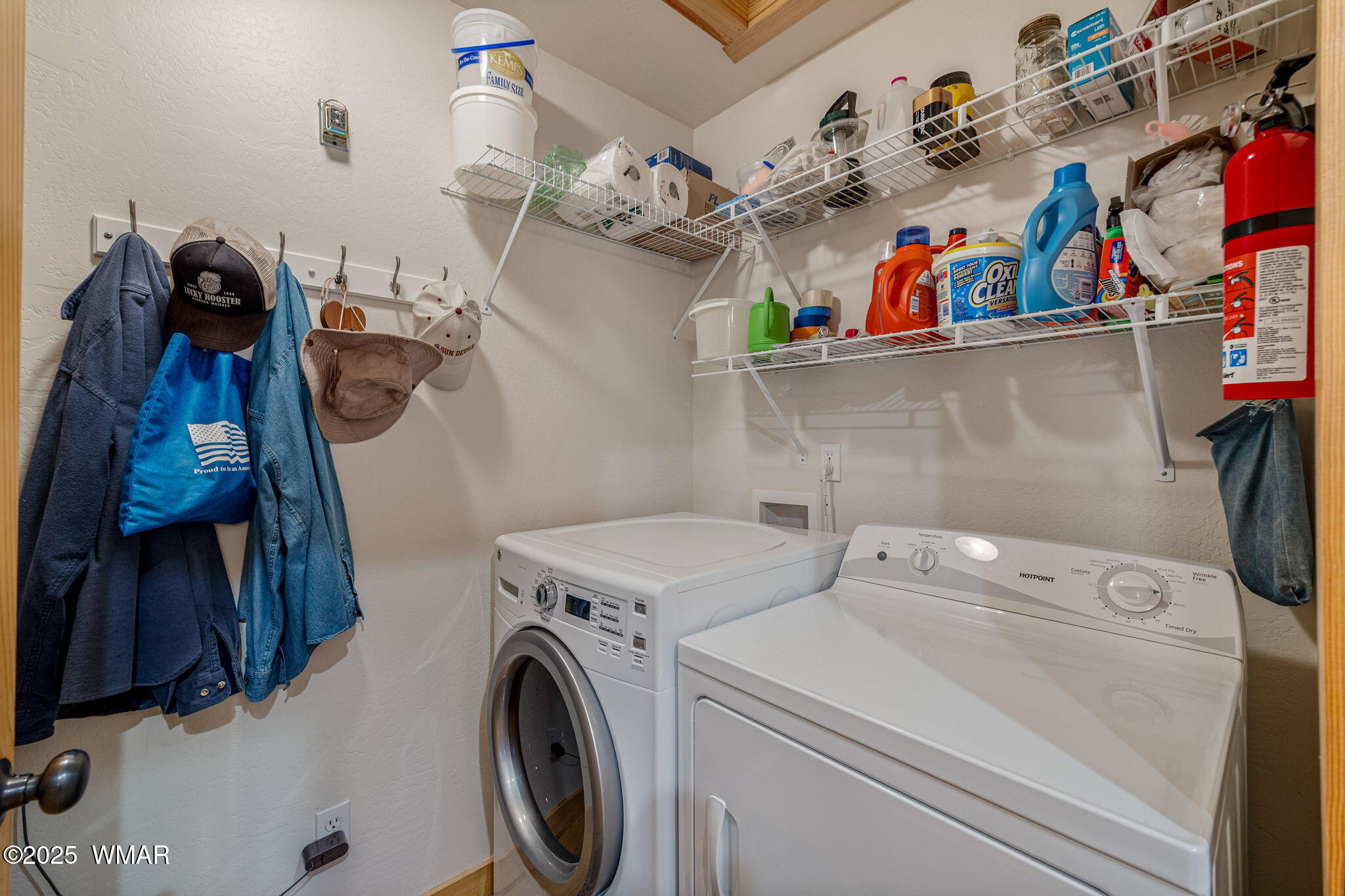 3142 Ranch Road Overgaard, AZ 85933 - Photo 22 of 35 a utility room with dryer and washer