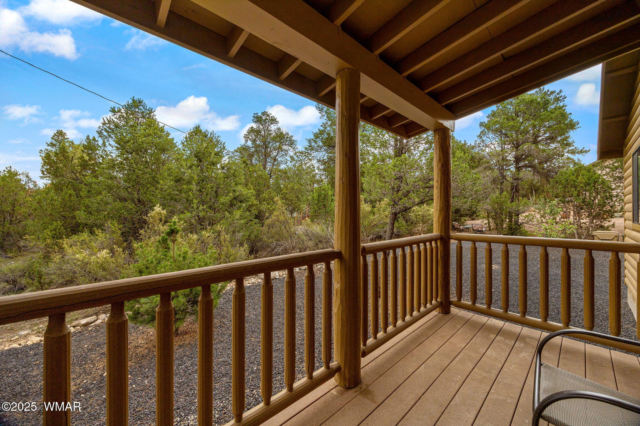 3142 Ranch Road Overgaard, AZ 85933 - Photo 23 of 35 a view of a balcony with wooden floor