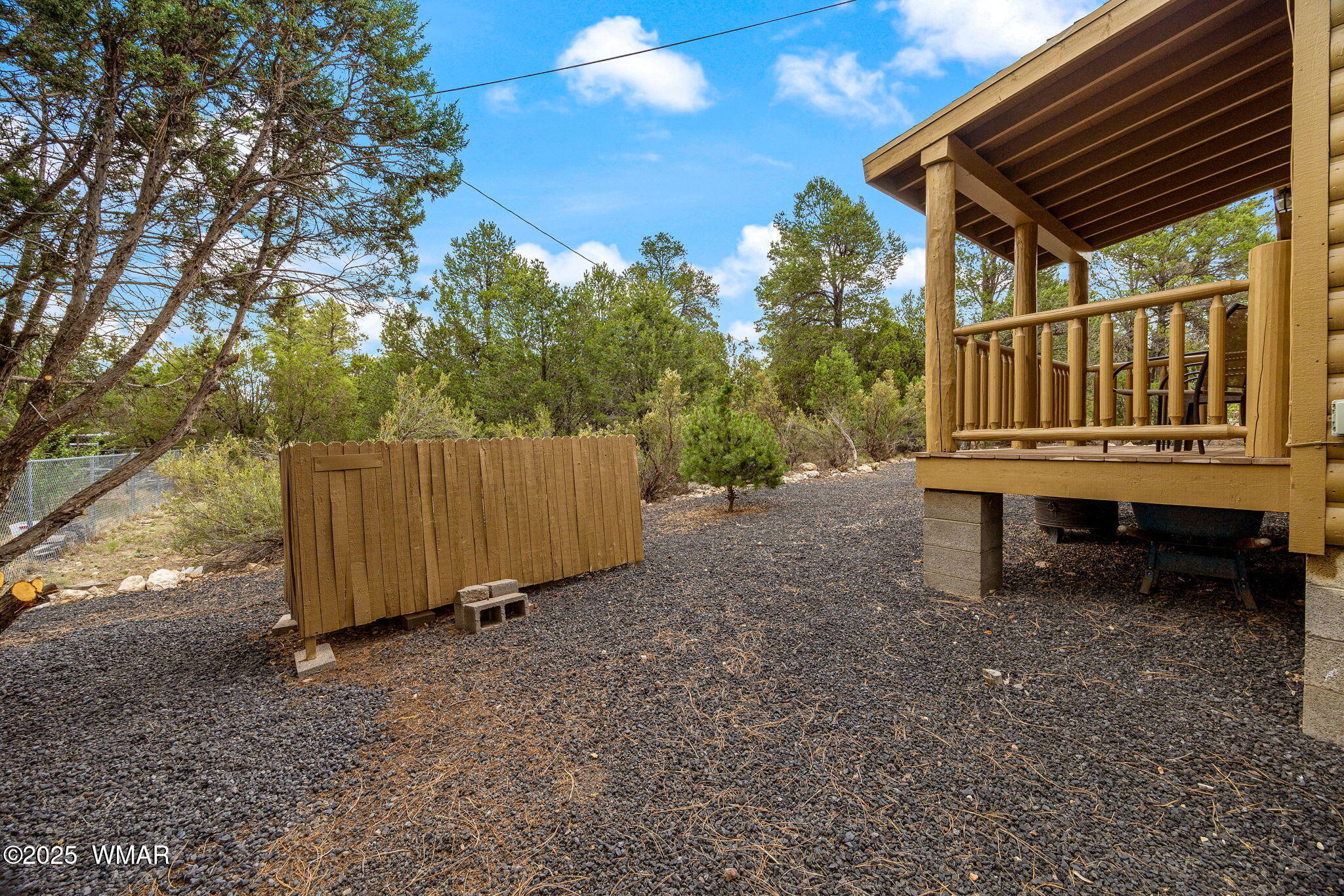 3142 Ranch Road Overgaard, AZ 85933 - Photo 24 of 35 a view of a house with a yard deck and furniture