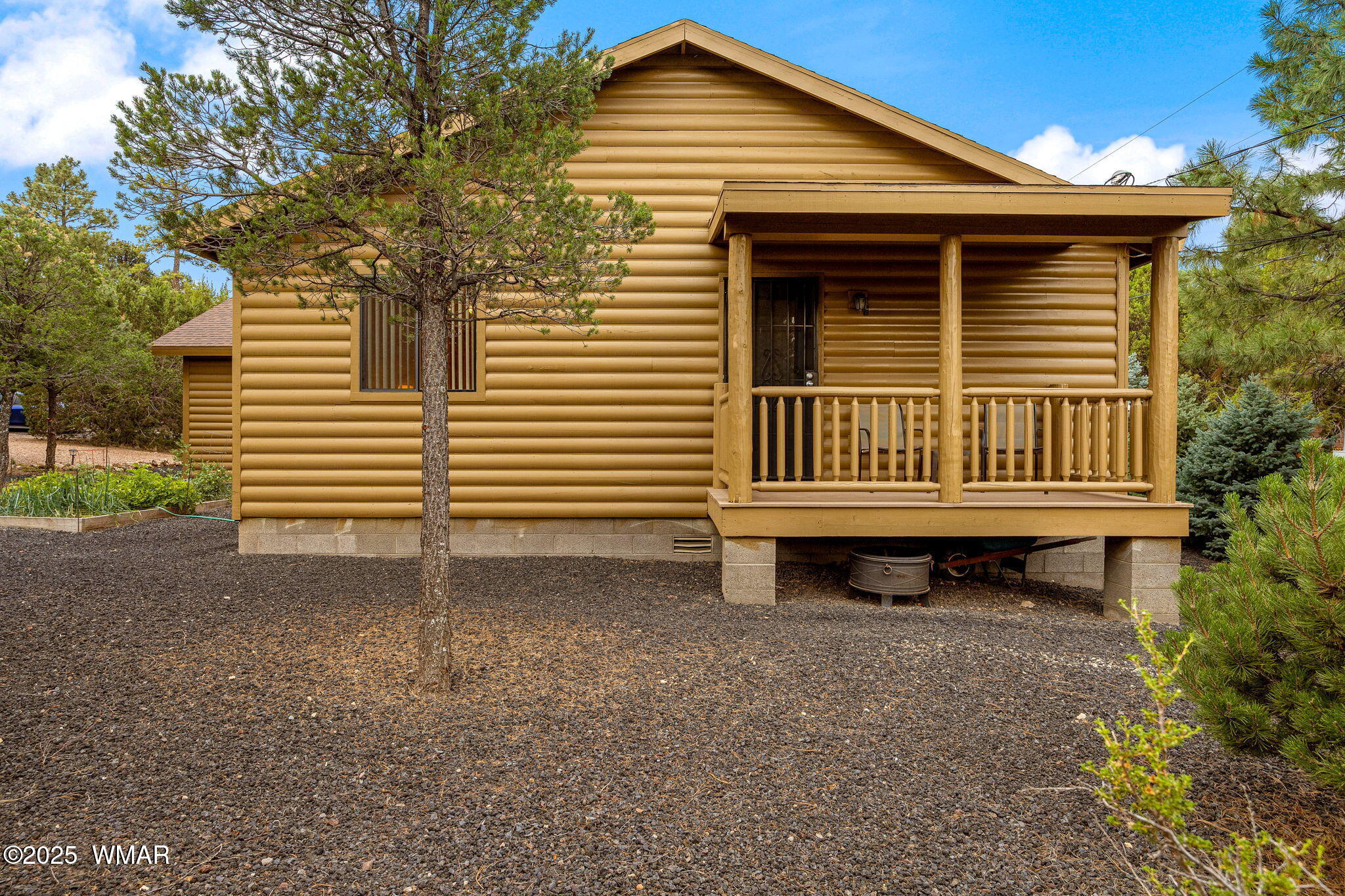3142 Ranch Road Overgaard, AZ 85933 - Photo 26 of 35 a front view of a house with a yard
