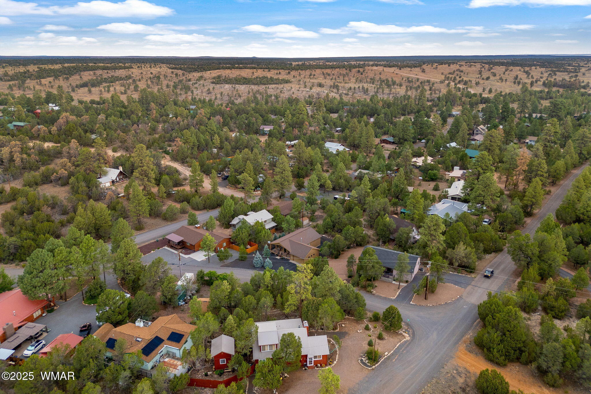 3142 Ranch Road Overgaard, AZ 85933 - Photo 31 of 35 an aerial view of multiple house