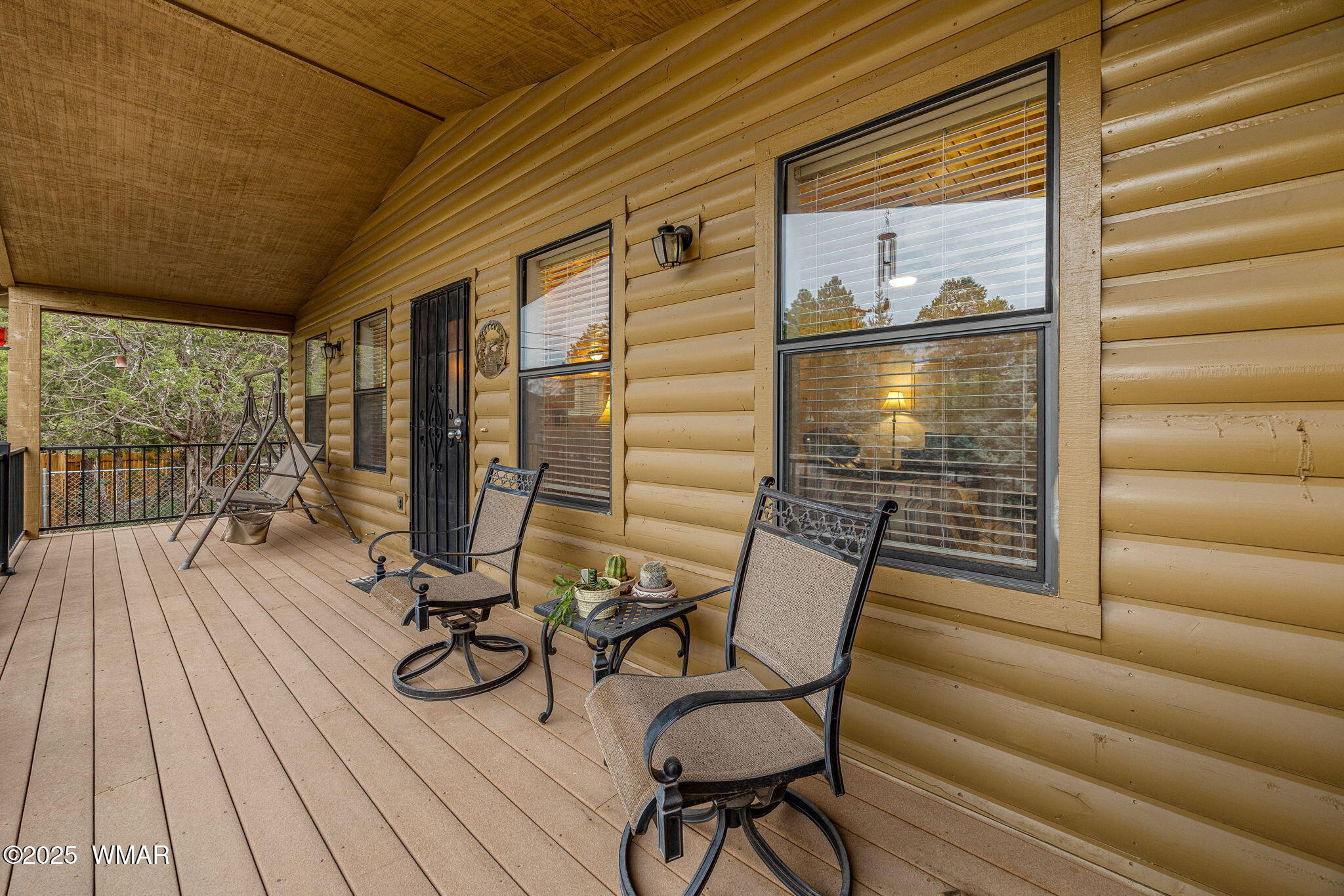 3142 Ranch Road Overgaard, AZ 85933 - Photo 6 of 35 a view of a chairs and table on the deck