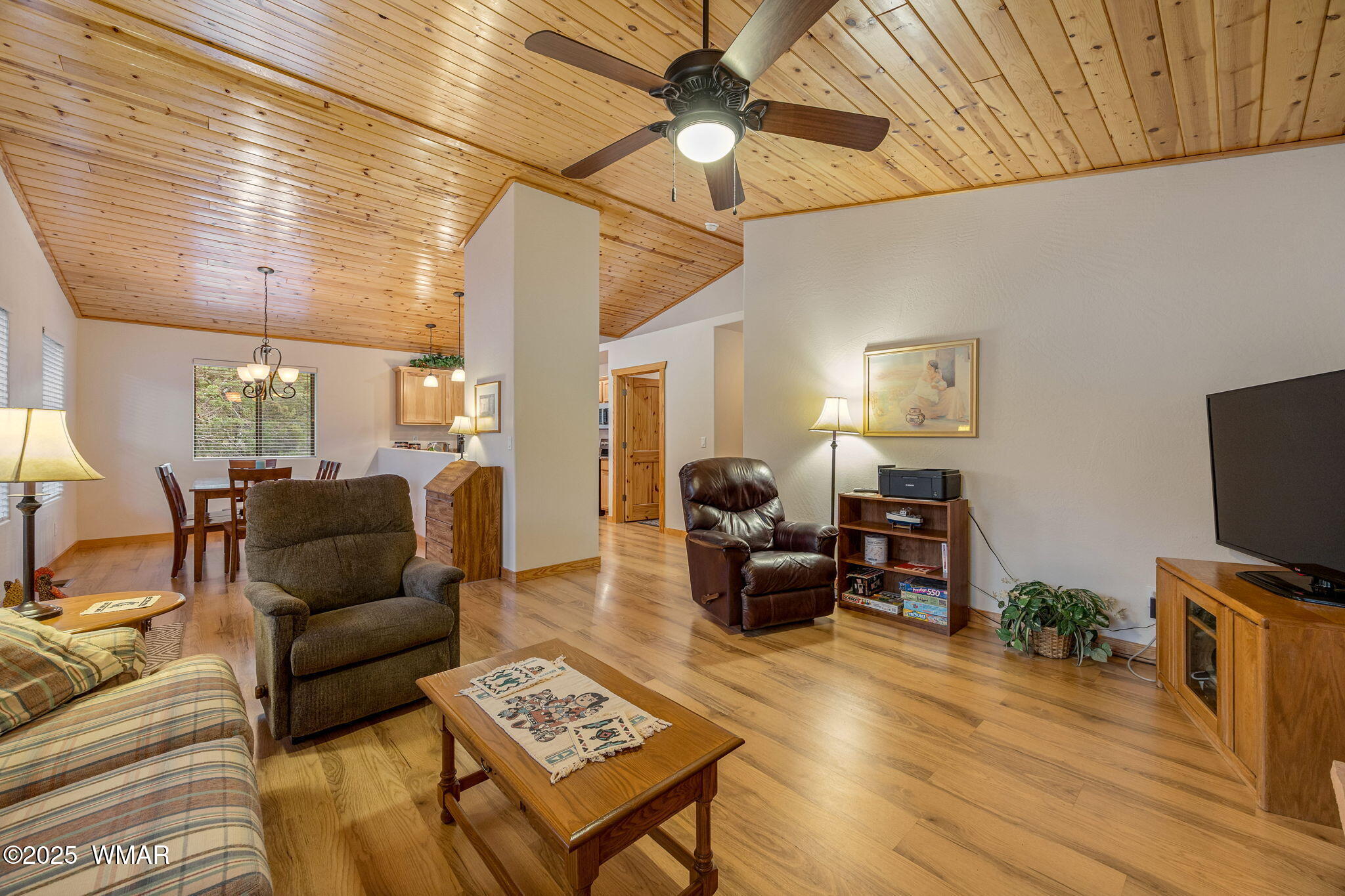 3142 Ranch Road Overgaard, AZ 85933 - Photo 9 of 35 a living room with furniture and a flat screen tv