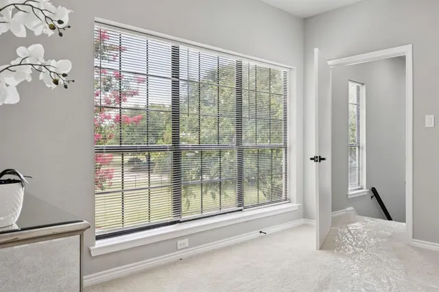 a view of a bathroom with a window