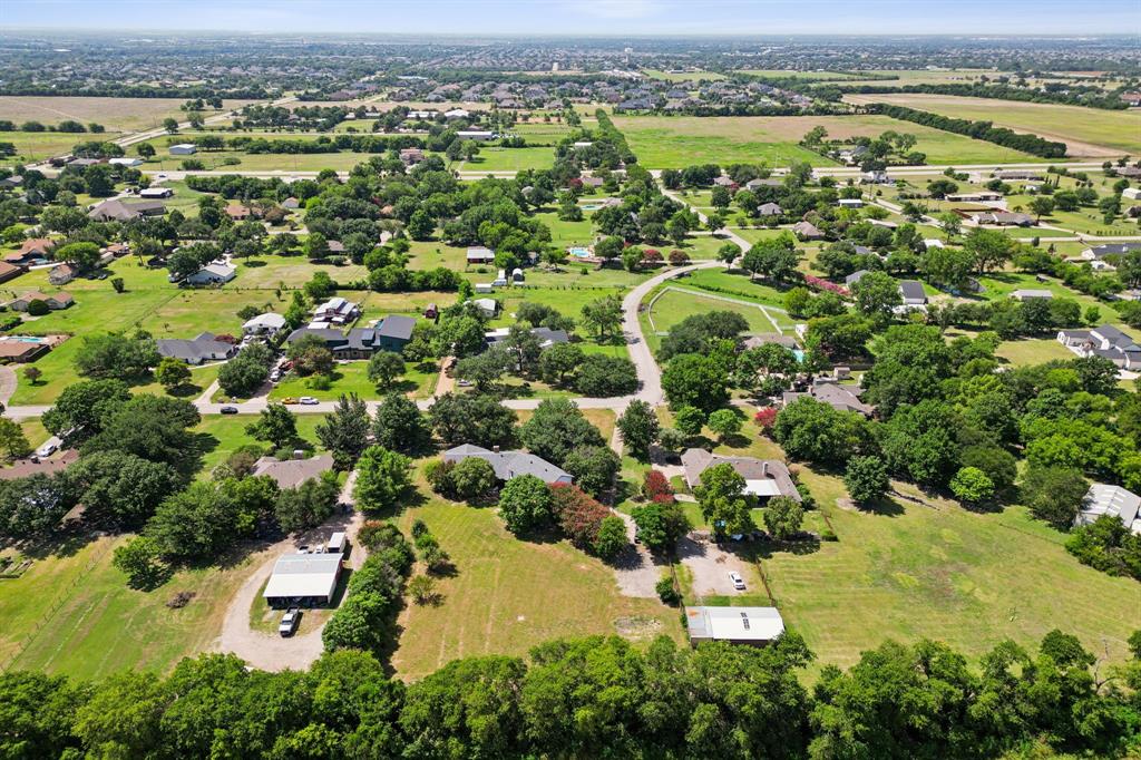 10 Chisholm Trail Lucas, TX 75002 - Photo 40 of 40 an aerial view of residential houses with outdoor space