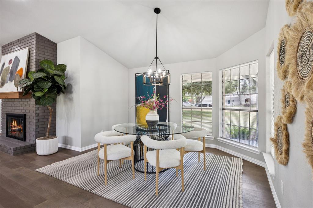 10 Chisholm Trail Lucas, TX 75002 - Photo 6 of 40 a living room with furniture and a fireplace