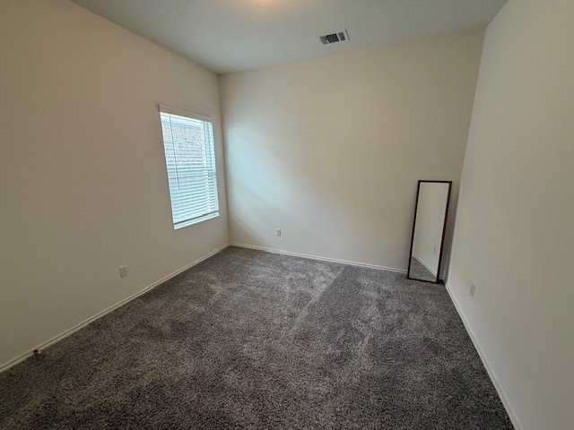 1745 Woolsey Way Leander, TX 78641 - Photo 15 of 20 an empty room with windows