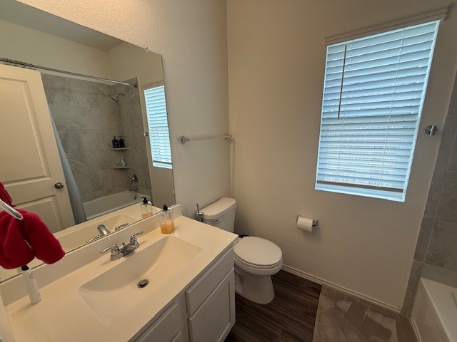 1745 Woolsey Way Leander, TX 78641 - Photo 16 of 20 a bathroom with a sink toilet and shower