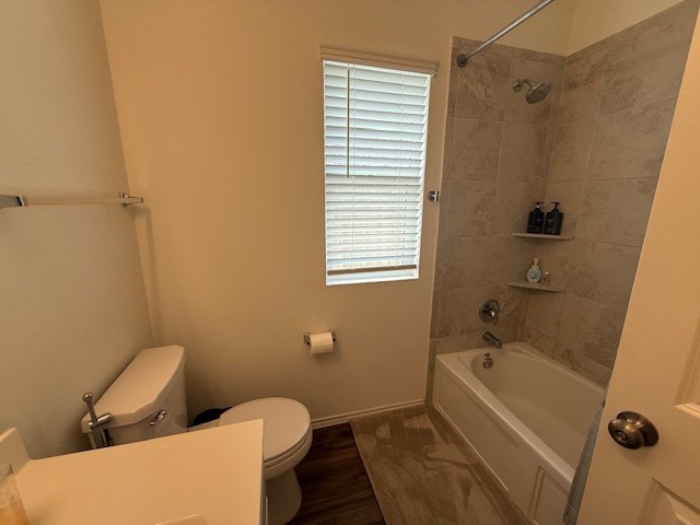 1745 Woolsey Way Leander, TX 78641 - Photo 17 of 20 a bathroom with a sink and bathtub with shower