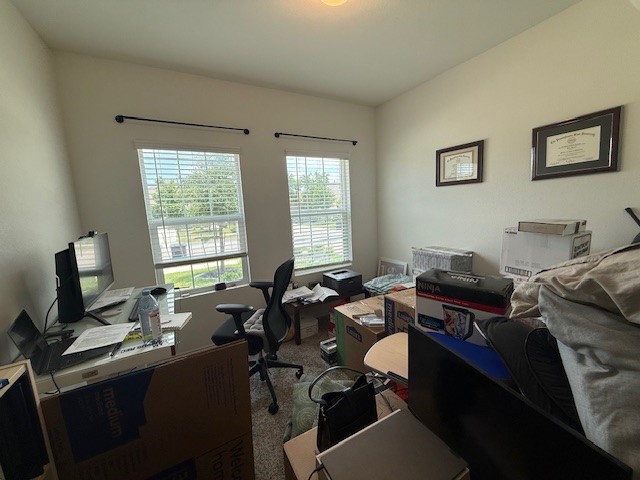 1745 Woolsey Way Leander, TX 78641 - Photo 18 of 20 a view of a workspace with a window