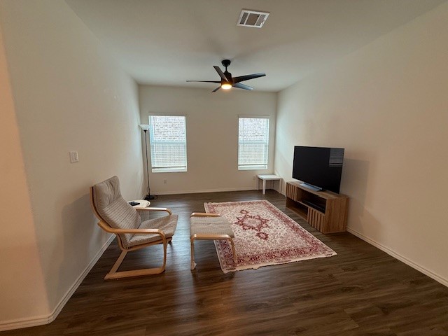 1745 Woolsey Way Leander, TX 78641 - Photo 5 of 20 a bedroom with furniture and a flat screen tv