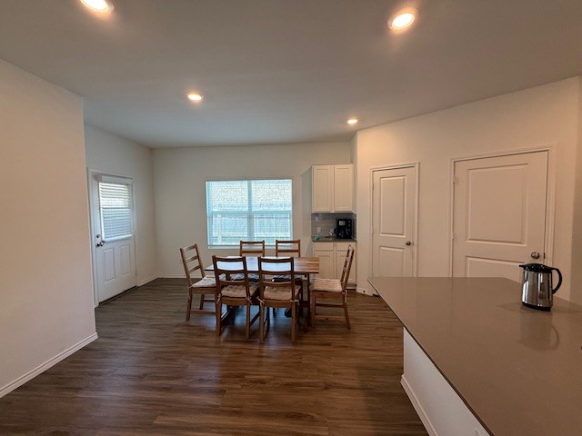 1745 Woolsey Way Leander, TX 78641 - Photo 7 of 20 a view of a dining room with furniture and window