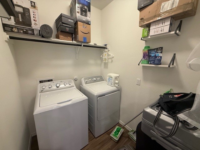 1745 Woolsey Way Leander, TX 78641 - Photo 9 of 20 a utility room with dryer and washer