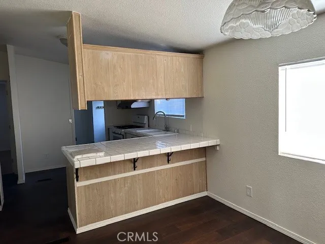 a view of washer and dryer sitting on a table