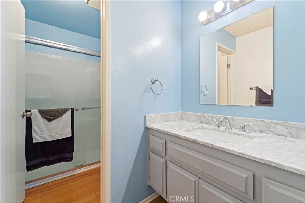 811 Cinnamon Lane Duarte, CA 91010 - Photo 11 of 22 a bathroom with a sink and a mirror
