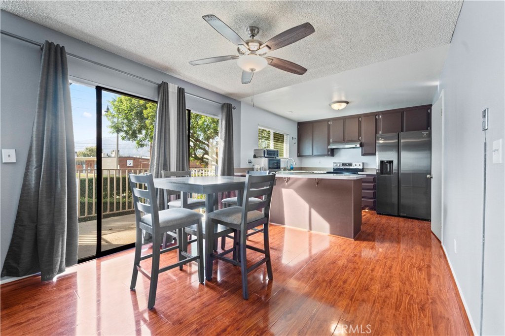 811 Cinnamon Lane Duarte, CA 91010 - Photo 15 of 22 a view of a dining room with furniture window and wooden floor