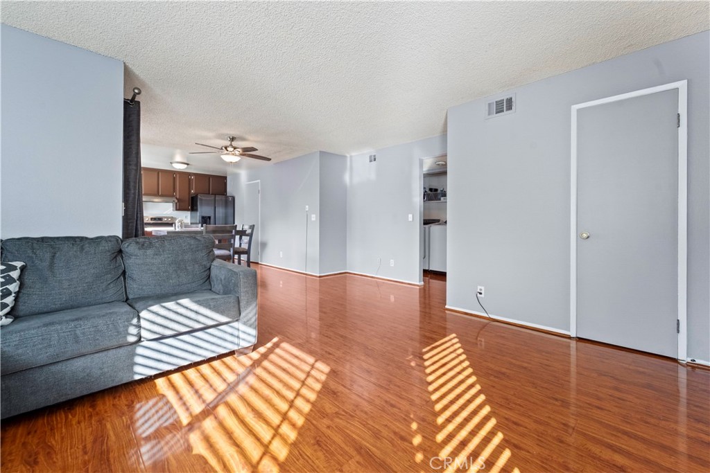 811 Cinnamon Lane Duarte, CA 91010 - Photo 3 of 22 a living room with furniture and a wooden floor