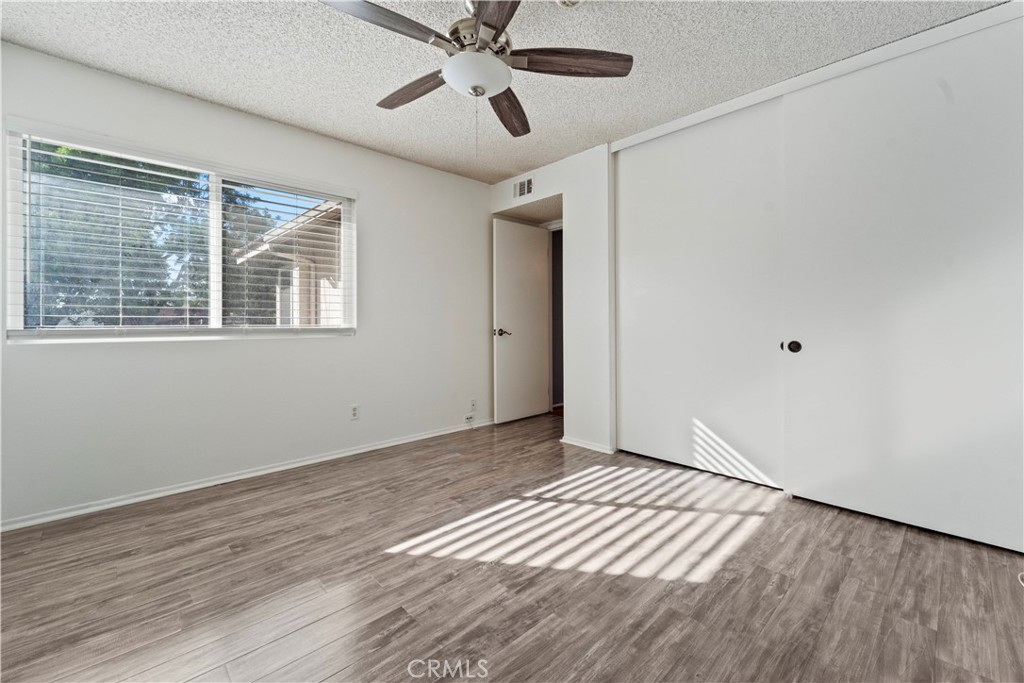 811 Cinnamon Lane Duarte, CA 91010 - Photo 5 of 22 a view of an empty room with wooden floor and a window