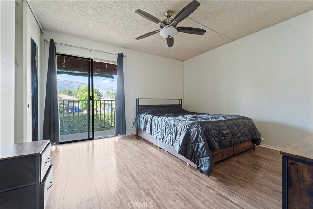 811 Cinnamon Lane Duarte, CA 91010 - Photo 10 of 22 a bedroom with a large bed and a large window