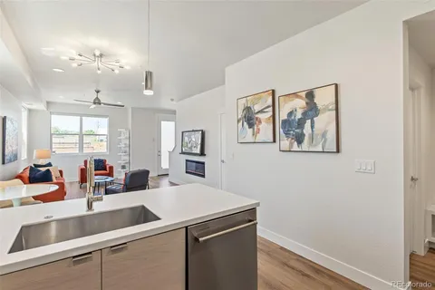 a view of a kitchen from the hallway