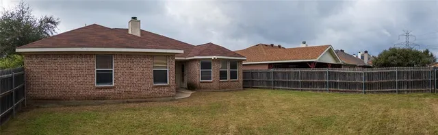 a house view with a garden space