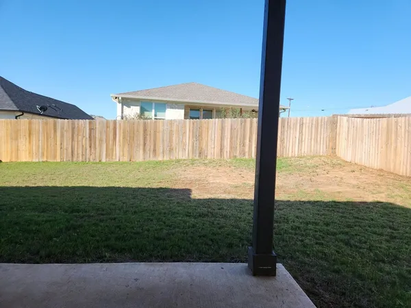 a view of a big room with a big yard