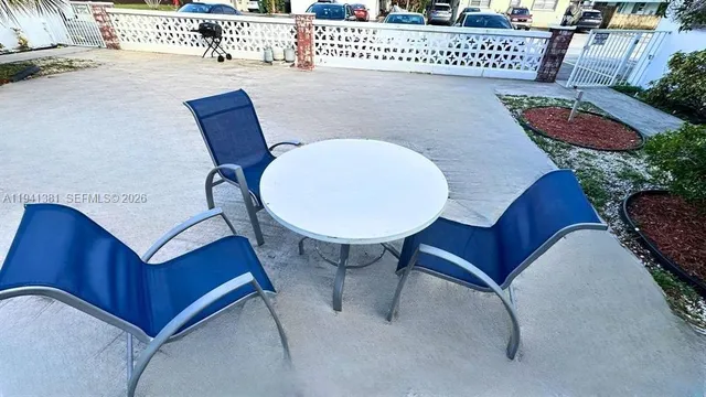 a view of a chairs in a patio