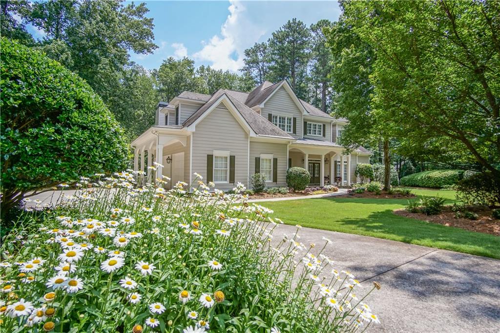 3211 Bob Cox Road Marietta, GA 30064 - Photo 1 of 1 WELCOME HOME TO YOUR EXQUISITE CRAFTSMAN-STYLE BEAUTY NESTLED ON ALMOST 3 ACRES IN A GATED COMMUNITY!