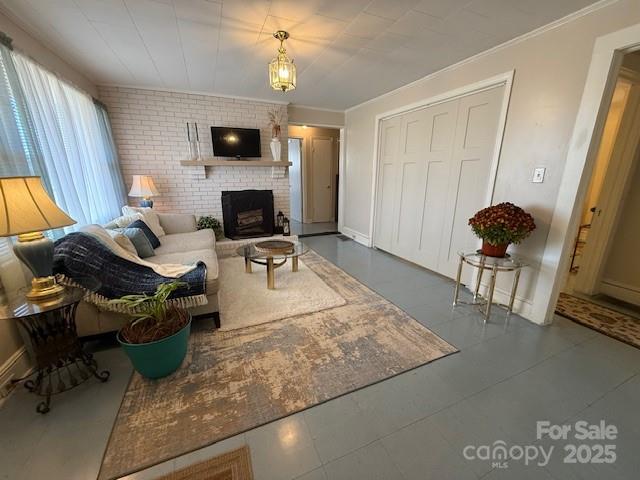 420 Virginia Street Southwest Lenoir, NC 28645 - Photo 28 of 36 a living room with furniture and a fireplace