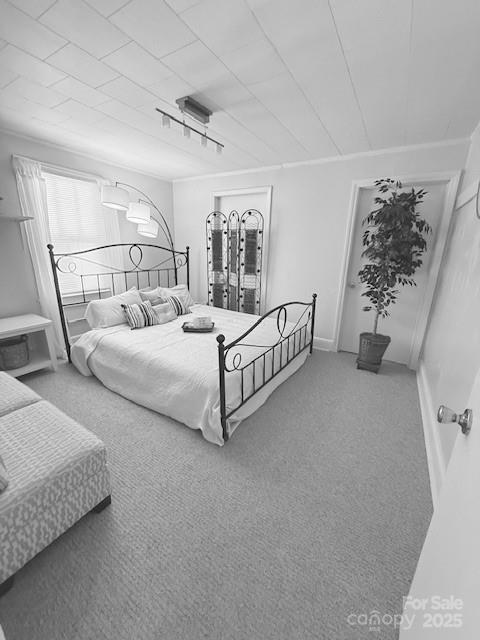 420 Virginia Street Southwest Lenoir, NC 28645 - Photo 32 of 36 a room with a bed and a couch