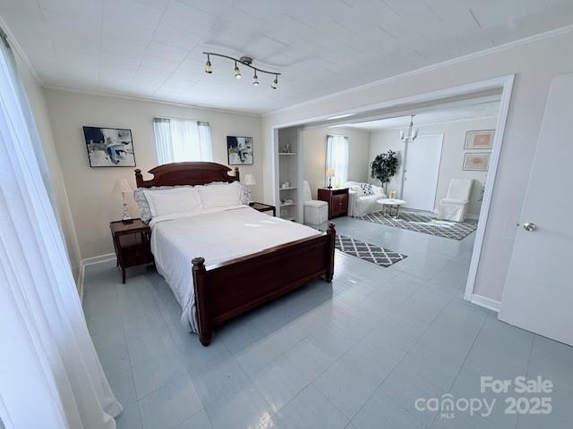 420 Virginia Street Southwest Lenoir, NC 28645 - Photo 33 of 36 a living room with a bed furniture and a window