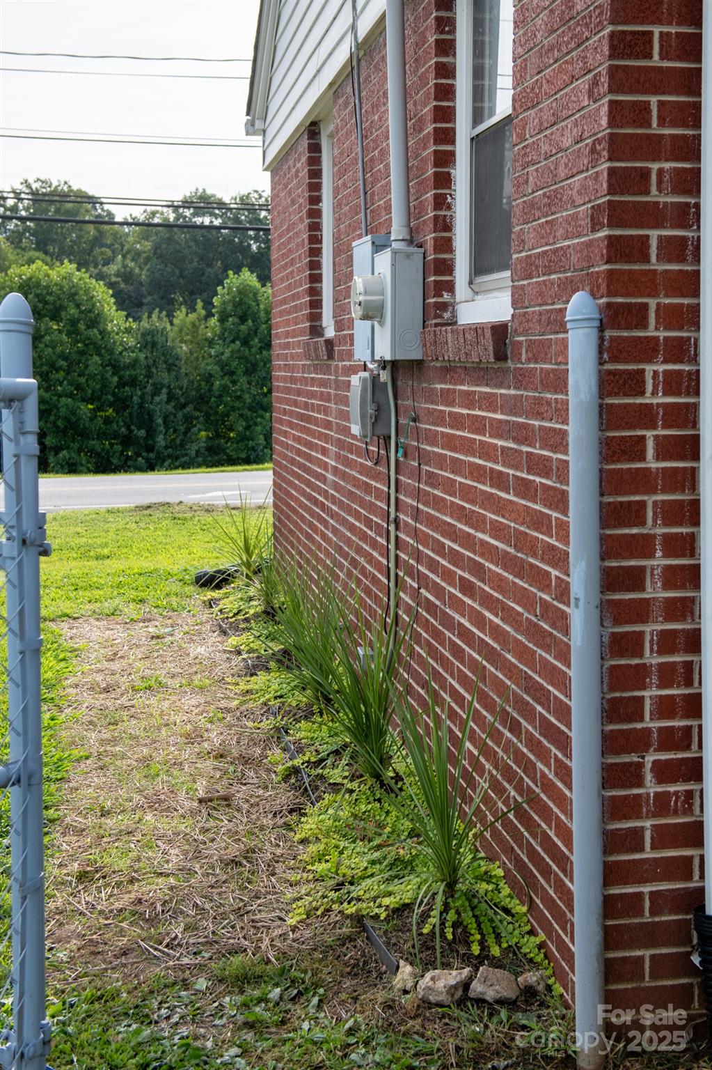 420 Virginia Street Southwest Lenoir, NC 28645 - Photo 4 of 36 a view of a door and brick wall