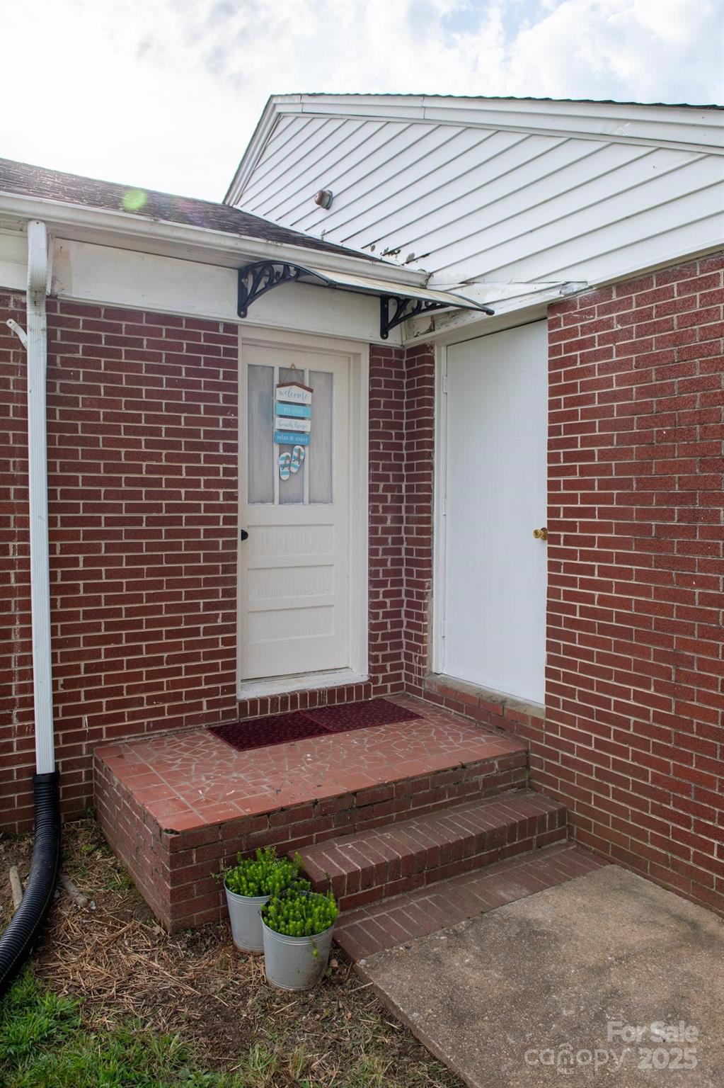 420 Virginia Street Southwest Lenoir, NC 28645 - Photo 5 of 36 a front view of a house with porch