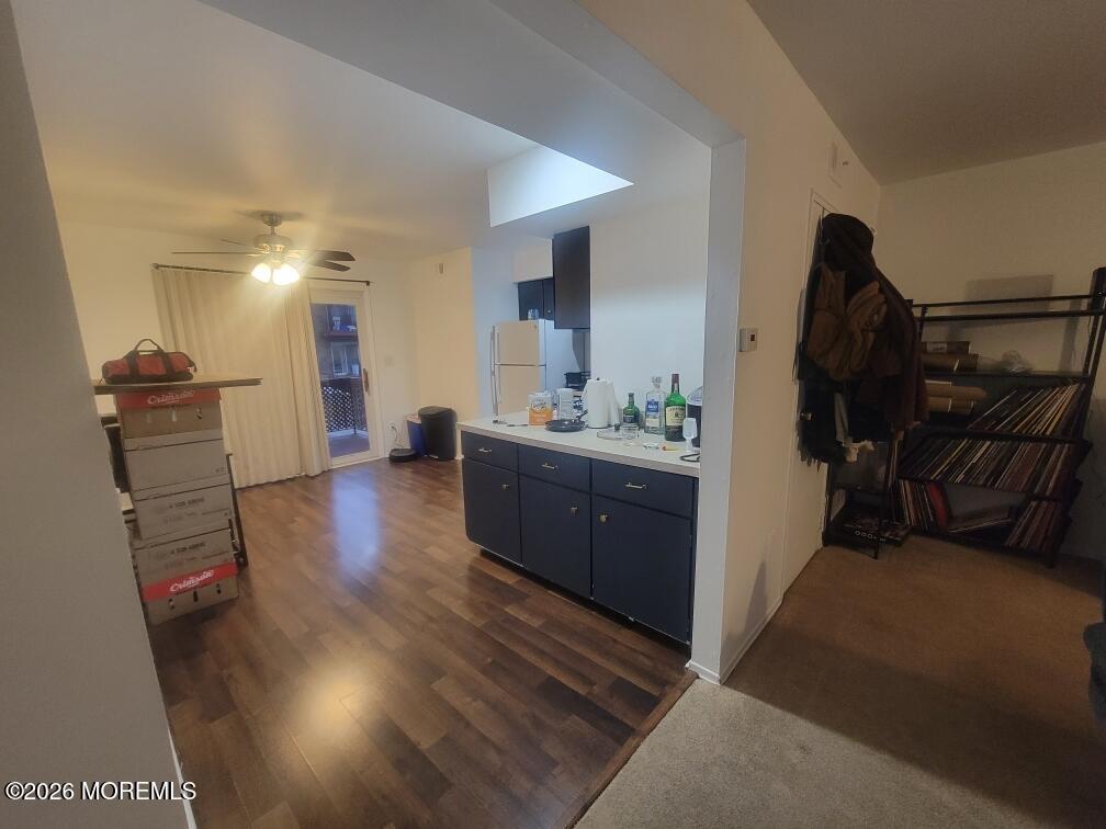 26 Judson Street, Unit 3A Edison, NJ 08837 - Photo 6 of 10 a living room with furniture a flat screen tv and a wooden floor