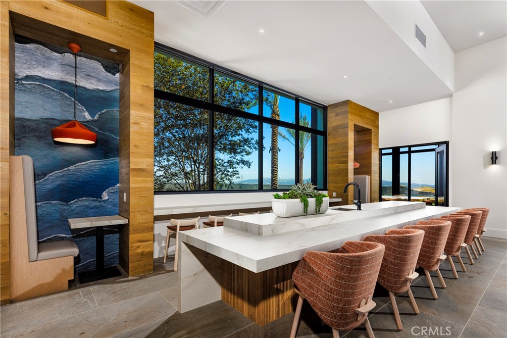 338 Plume Way Montebello, CA 90640 - Photo 16 of 19 a dining room with furniture a floor to ceiling window and outdoor view