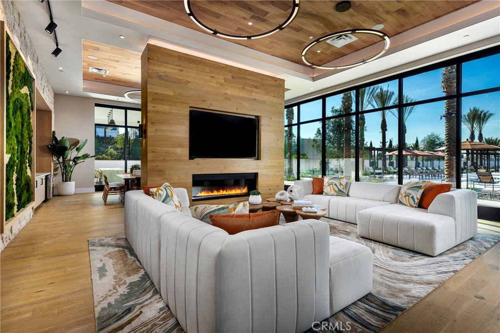 338 Plume Way Montebello, CA 90640 - Photo 18 of 19 a living room with furniture a flat screen tv and a large window