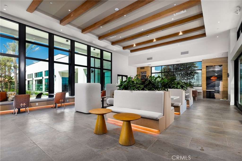 338 Plume Way Montebello, CA 90640 - Photo 9 of 19 a living room with patio furniture and a large window