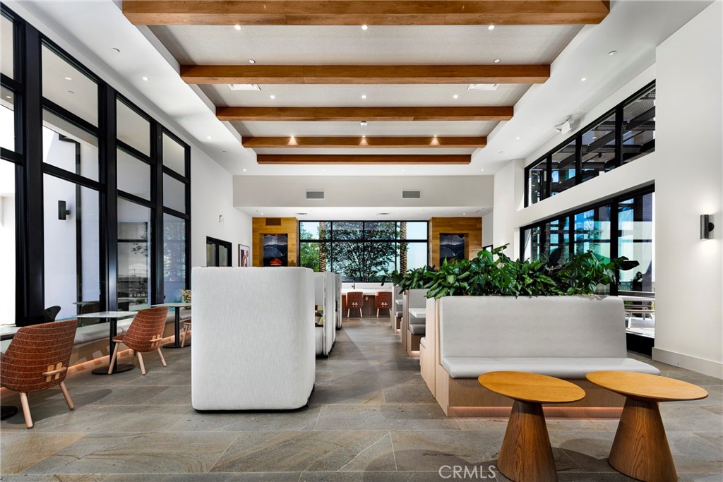 338 Plume Way Montebello, CA 90640 - Photo 10 of 19 a living room with a couch and chairs