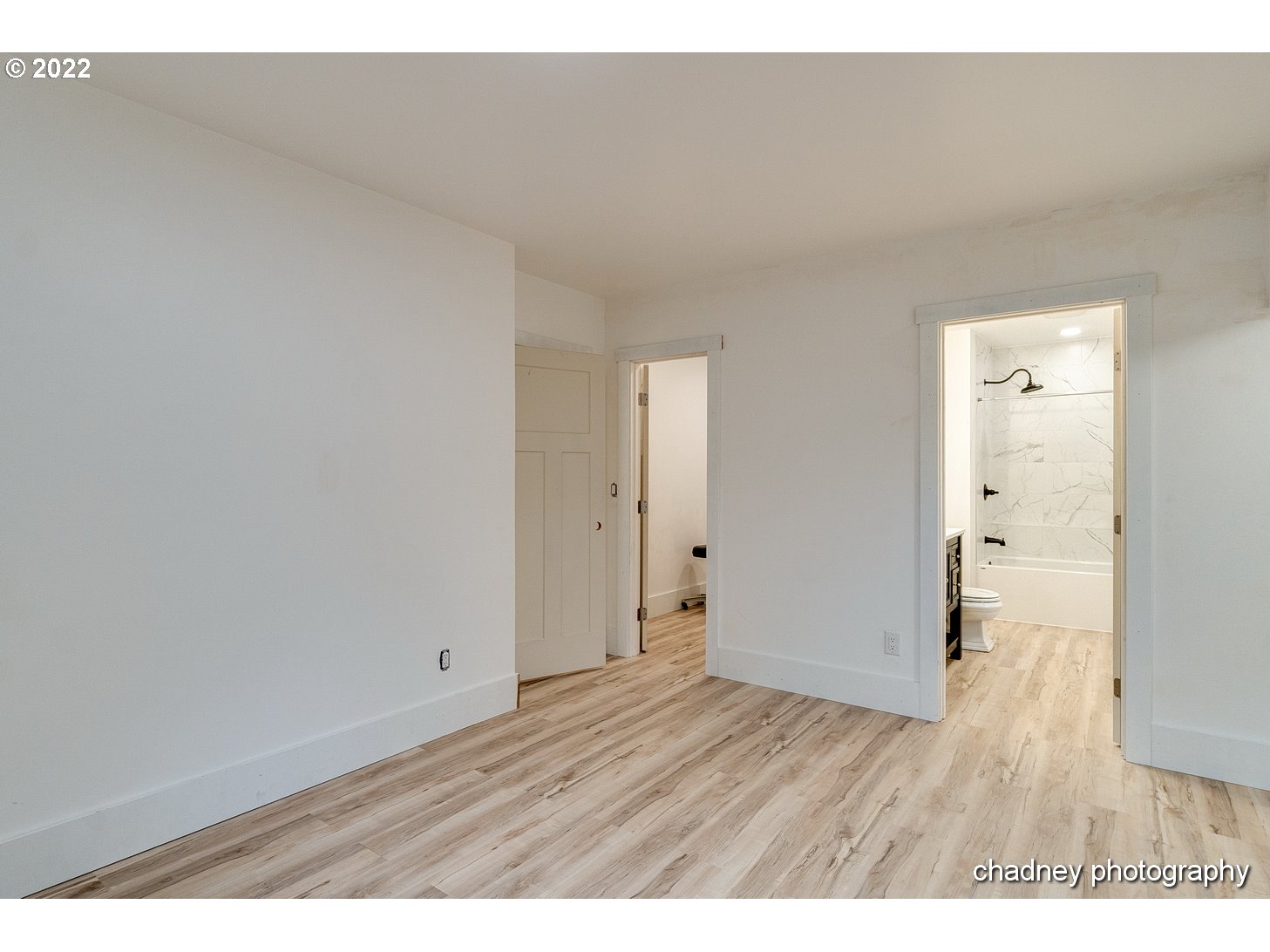 606 Southeast Northway Road Corbett, OR 97019 - Photo 16 of 32 a view of an empty room and wooden floor