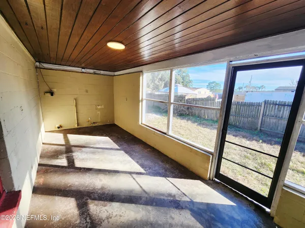 a view of entryway with wooden floor