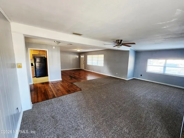 a view of hallway with natural light