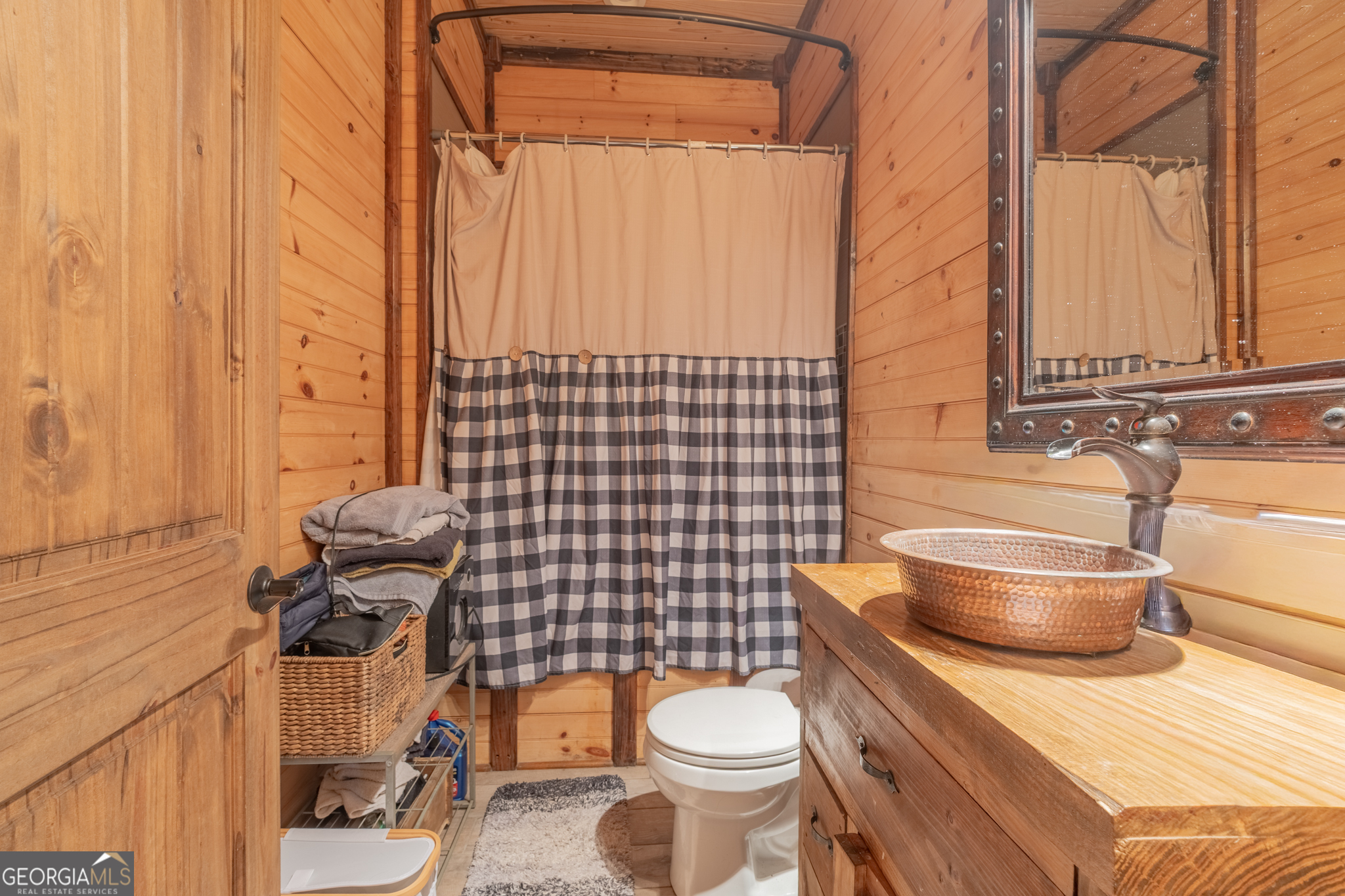 45 J J Davis Road Tallapoosa, GA 30176 - Photo 14 of 24 a bathroom with a sink and a toilet