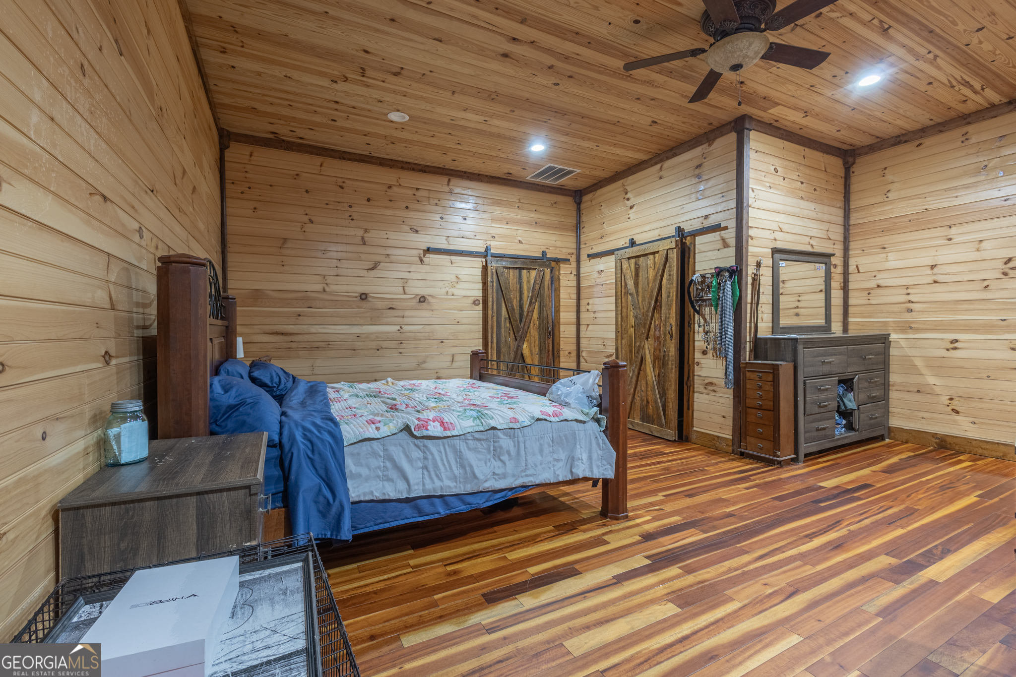 45 J J Davis Road Tallapoosa, GA 30176 - Photo 17 of 24 a spacious bedroom with a bed and a table