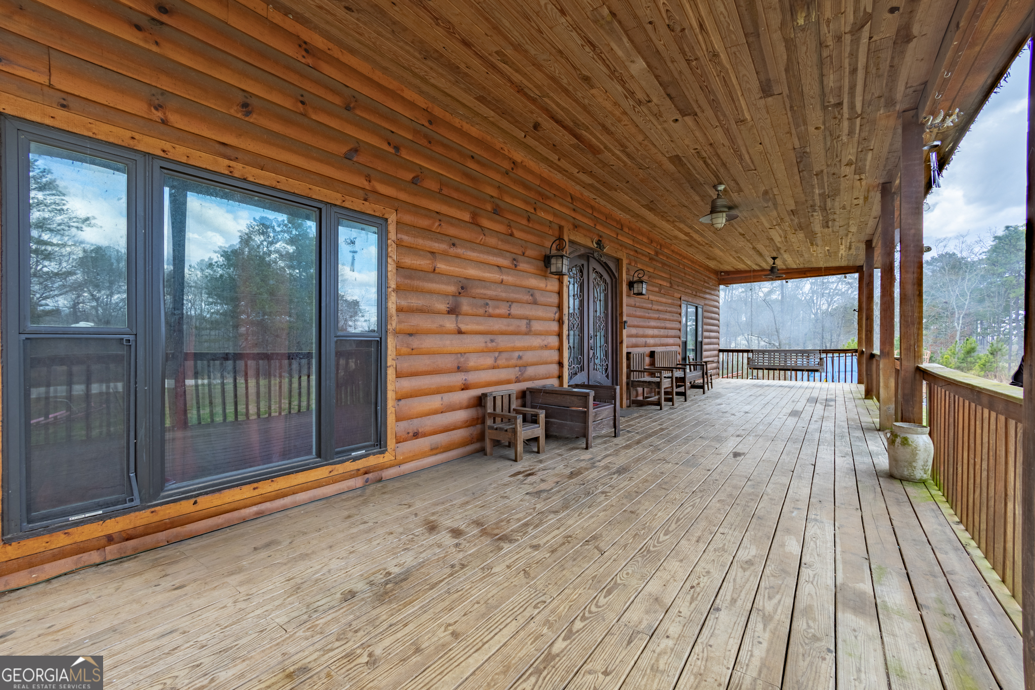 45 J J Davis Road Tallapoosa, GA 30176 - Photo 2 of 24 a view of outdoor space with wooden floor and iron stairs