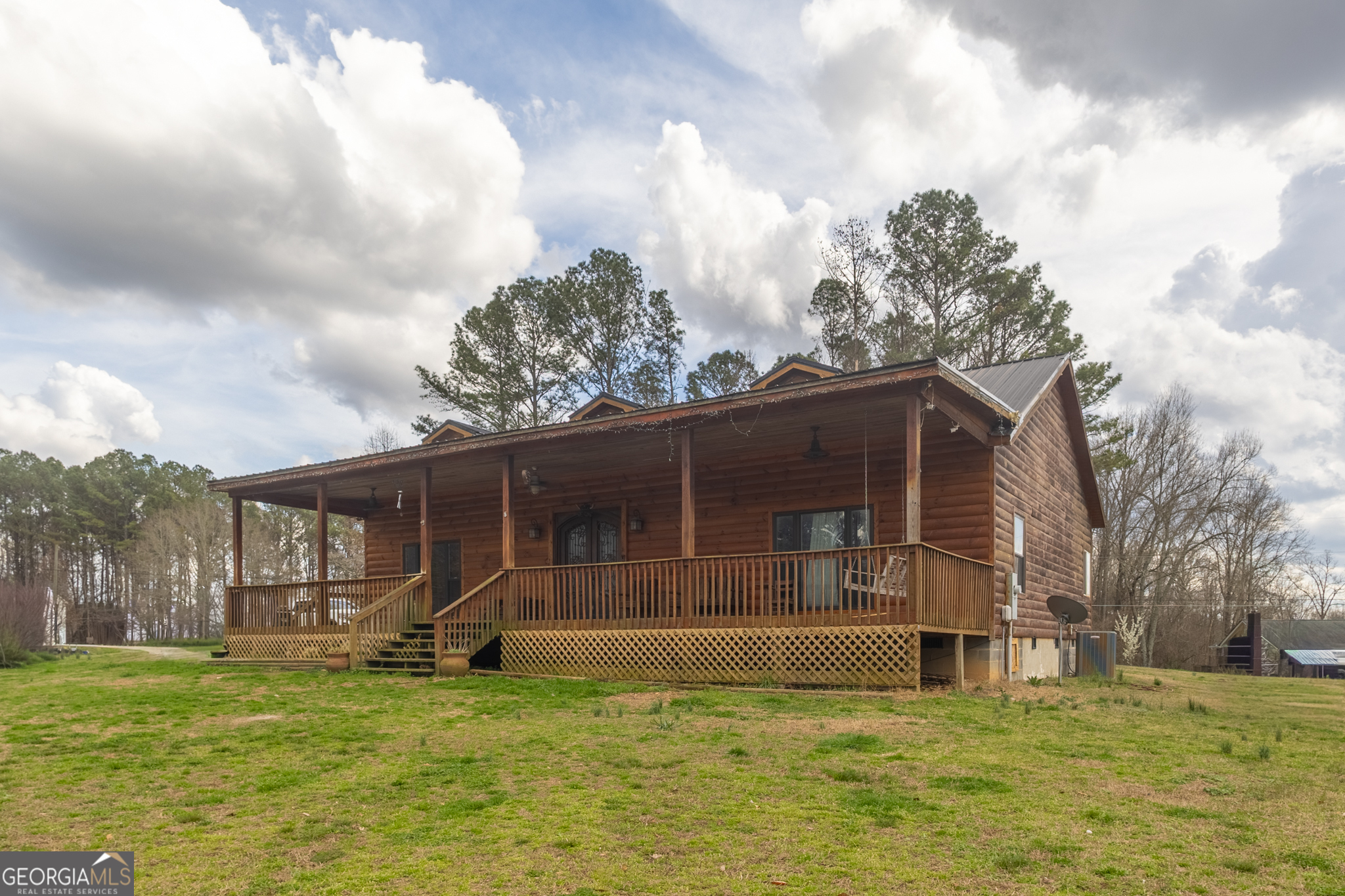 45 J J Davis Road Tallapoosa, GA 30176 - Photo 22 of 24 a view of a house with a yard