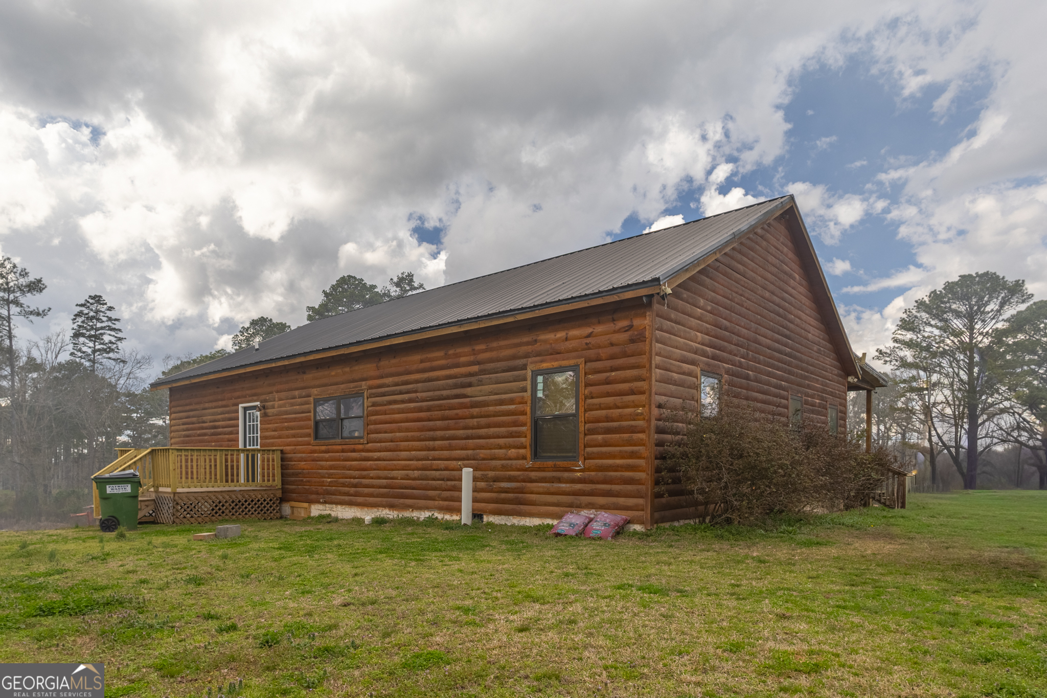 45 J J Davis Road Tallapoosa, GA 30176 - Photo 23 of 24 a view of a backyard of the house