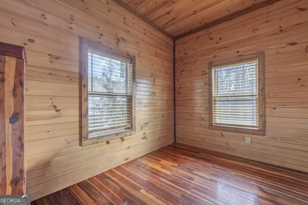 a view of a backyard of a house
