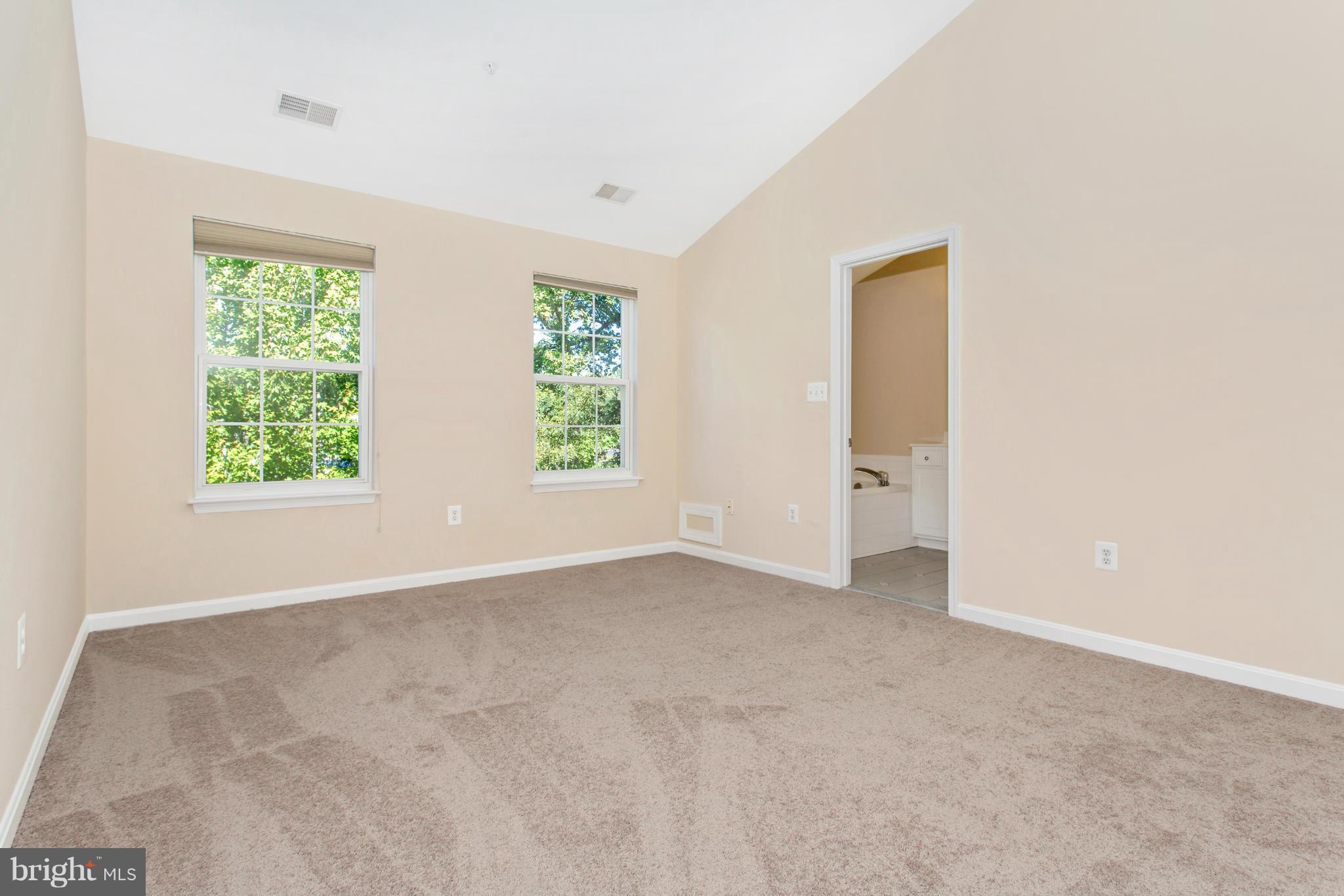 11006 Hemingway Court Silver Spring, MD 20902 - Photo 16 of 30 an empty room with windows